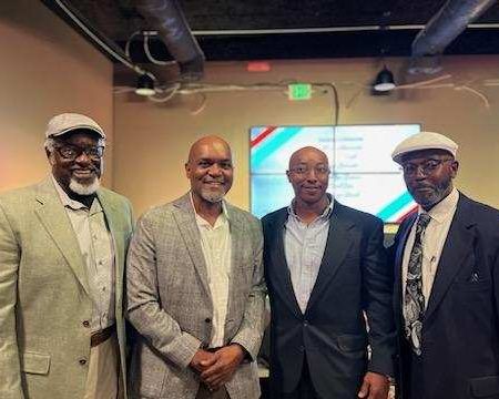 Restored voters Lee Garrett, Ron McKeithen, Joe Bennett, and Alonzo Hurth (left to right) at GBM's celebration of restored voters