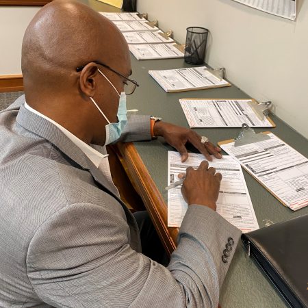 Restored voter Ronald McKeithen registering to vote!