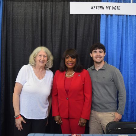 U.S. Rep. Terri Sewell with RMV's Dori Miles and intern Eli Moore at Sewell's annual job fair in Tuscaloosa.
